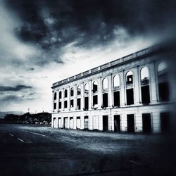 Building against cloudy sky