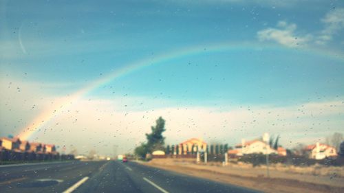 Road against cloudy sky