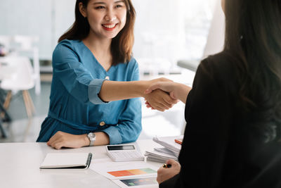 Business colleagues working at office