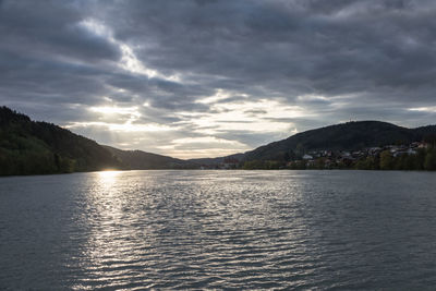 Scenic view of mountains against sky at sunset