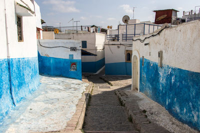 Alley amidst buildings in town