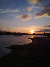 Scenic view of sunset over sea