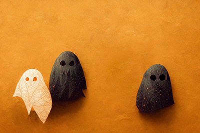 High angle view of heart shape on yellow wall