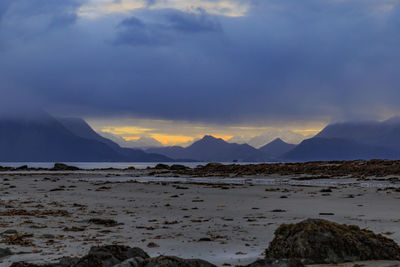 Scenic view of mountains against sky during sunset