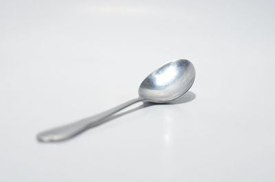 Close-up of electric lamp against white background