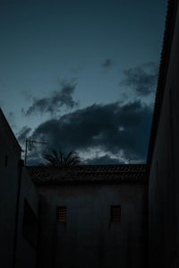 Low angle view of building against sky at night