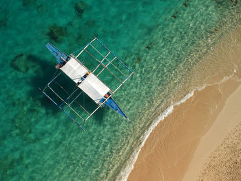 High angle view of waves on beach