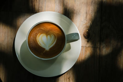 Cup of coffee on table