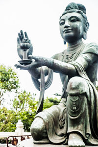 Low angle view of buddha statue