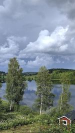 Scenic view of sea against cloudy sky