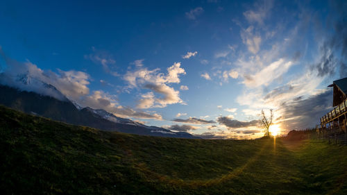 Scenic view of mountains at sunset