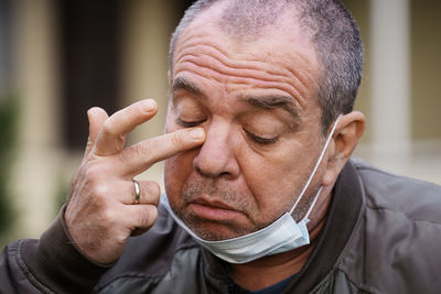 Portrait of man wearing mask