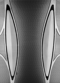 Close-up of metallic structure against white background