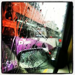 Reflection of car on side-view mirror