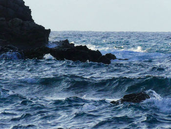 Scenic view of sea against clear sky