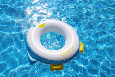 High angle view of inflatable ring in swimming pool