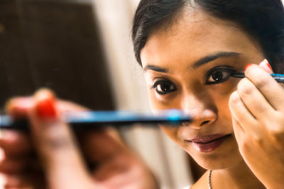 Close-up portrait of young woman