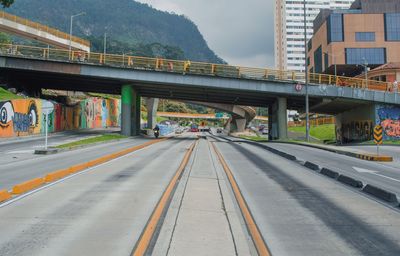 View of bridge over road in city