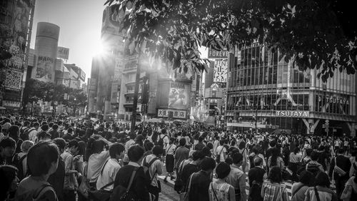 Crowd on street in city at night