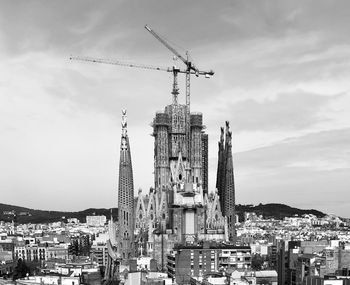 Low angle view of buildings in city against sky