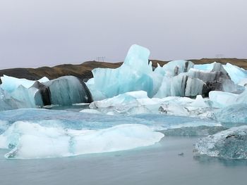 Scenic view of ice against sky