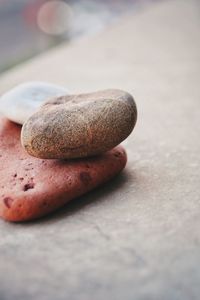 Close-up of pebble on table