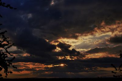 Scenic view of dramatic sky during sunset