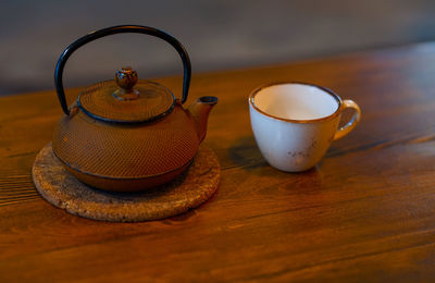 Close-up of tea cup on table