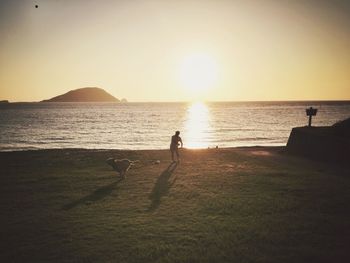 Scenic view of sea at sunset