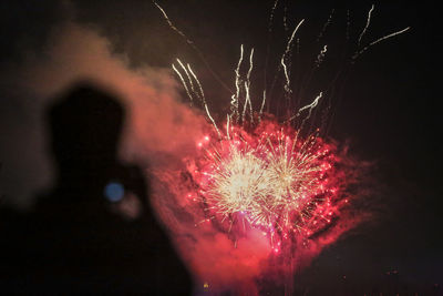 Firework display at night