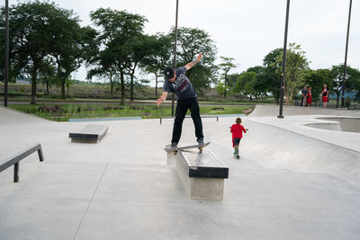 Man skateboarding on skateboard in city