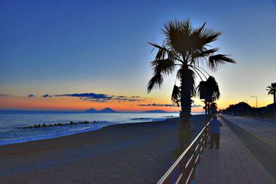 Scenic view of sea against sky at sunset