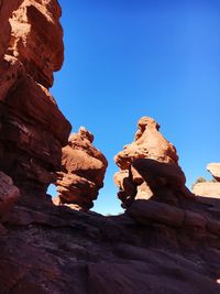 Low angle view of rock formations