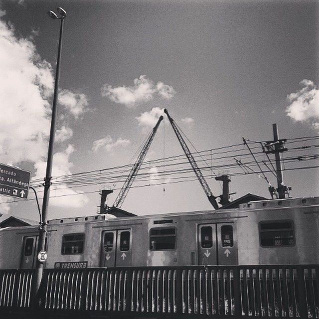 LOW ANGLE VIEW OF BUILT STRUCTURE AGAINST THE SKY