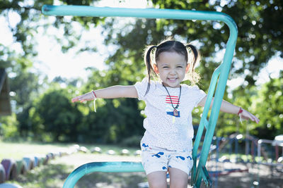 Portrait of boy playing in park