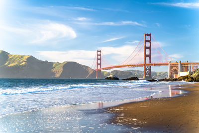 View of suspension bridge over sea