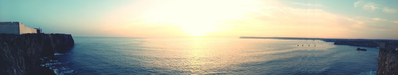 Scenic view of sea at sunset