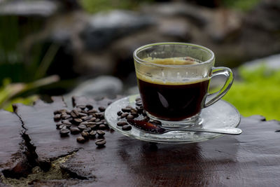 Close-up of coffee cup on table