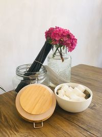 Close-up of flower vase on table