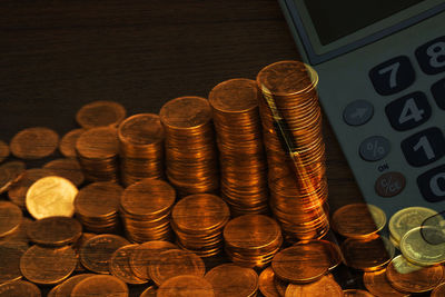 High angle view of coins on table