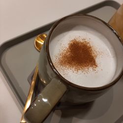 High angle view of coffee cup on table