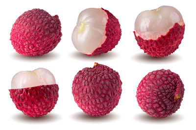 Close-up of fruits against white background