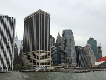 Modern buildings in city against sky