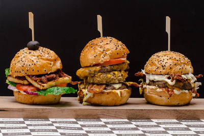 Close-up of food on table against black background