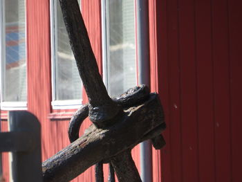 Close-up of window on wooden wall