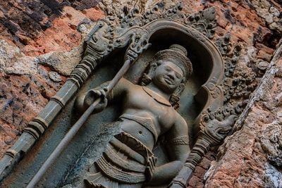 Low angle view of buddha statue