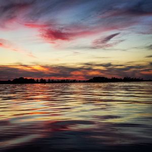 Scenic view of sunset over sea