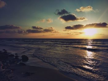 Scenic view of sea against sky during sunset