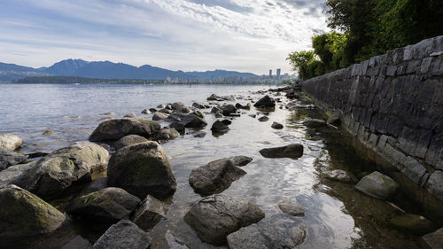 Rocky coast framed by rock wall, shot in vancouver, british columbia, canada