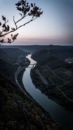 Scenic view of river against sky during sunset